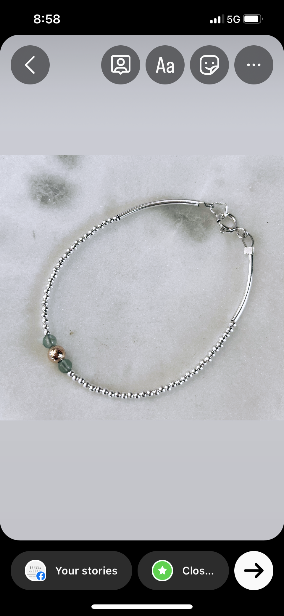 Solid silver bracelet with aqua apatite gemstones and gold ball