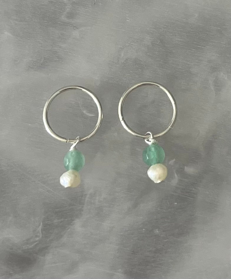 Solid silver sleepers with green gemstones and pearls.