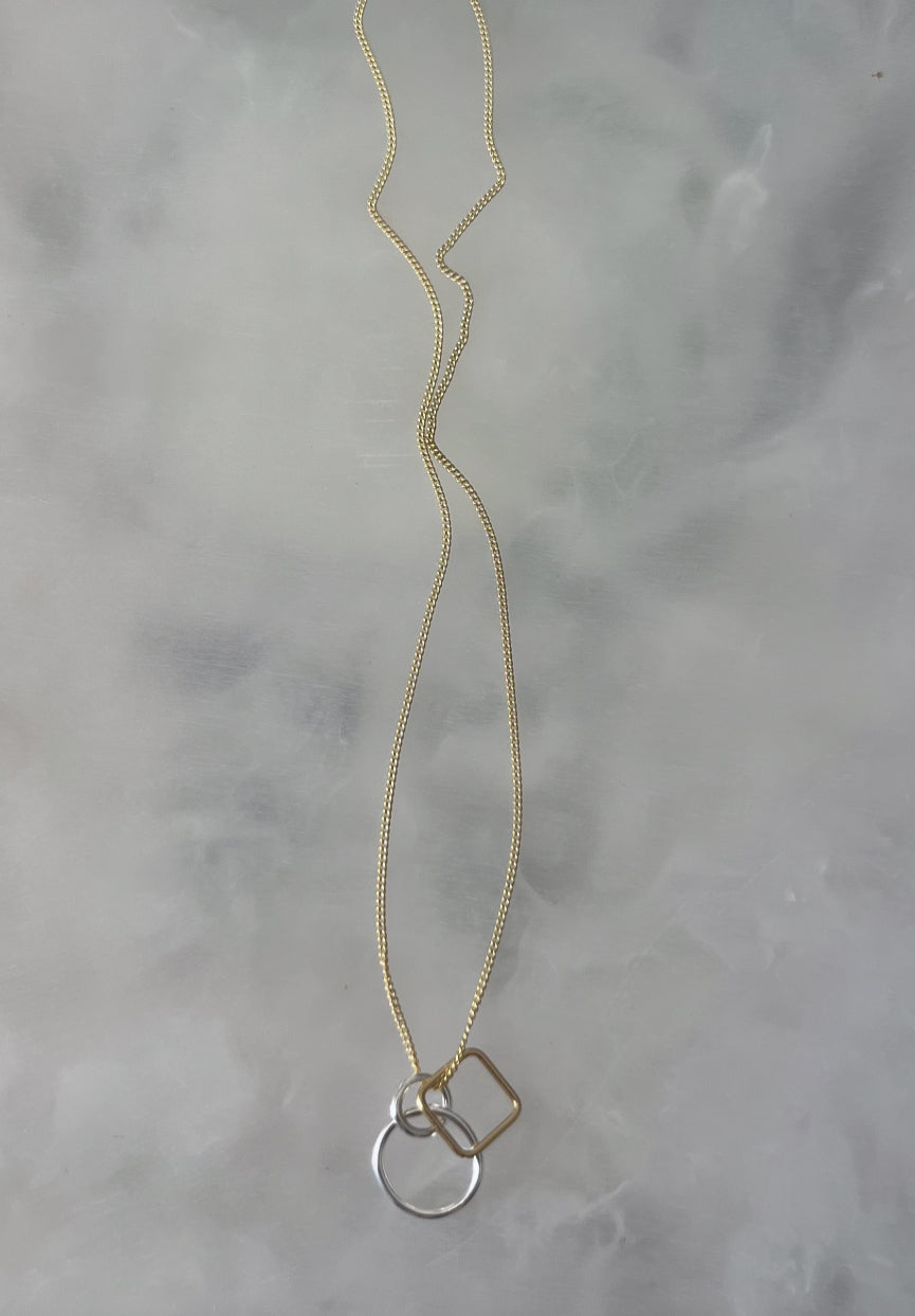 Gold chain with solid silver square and gold square
