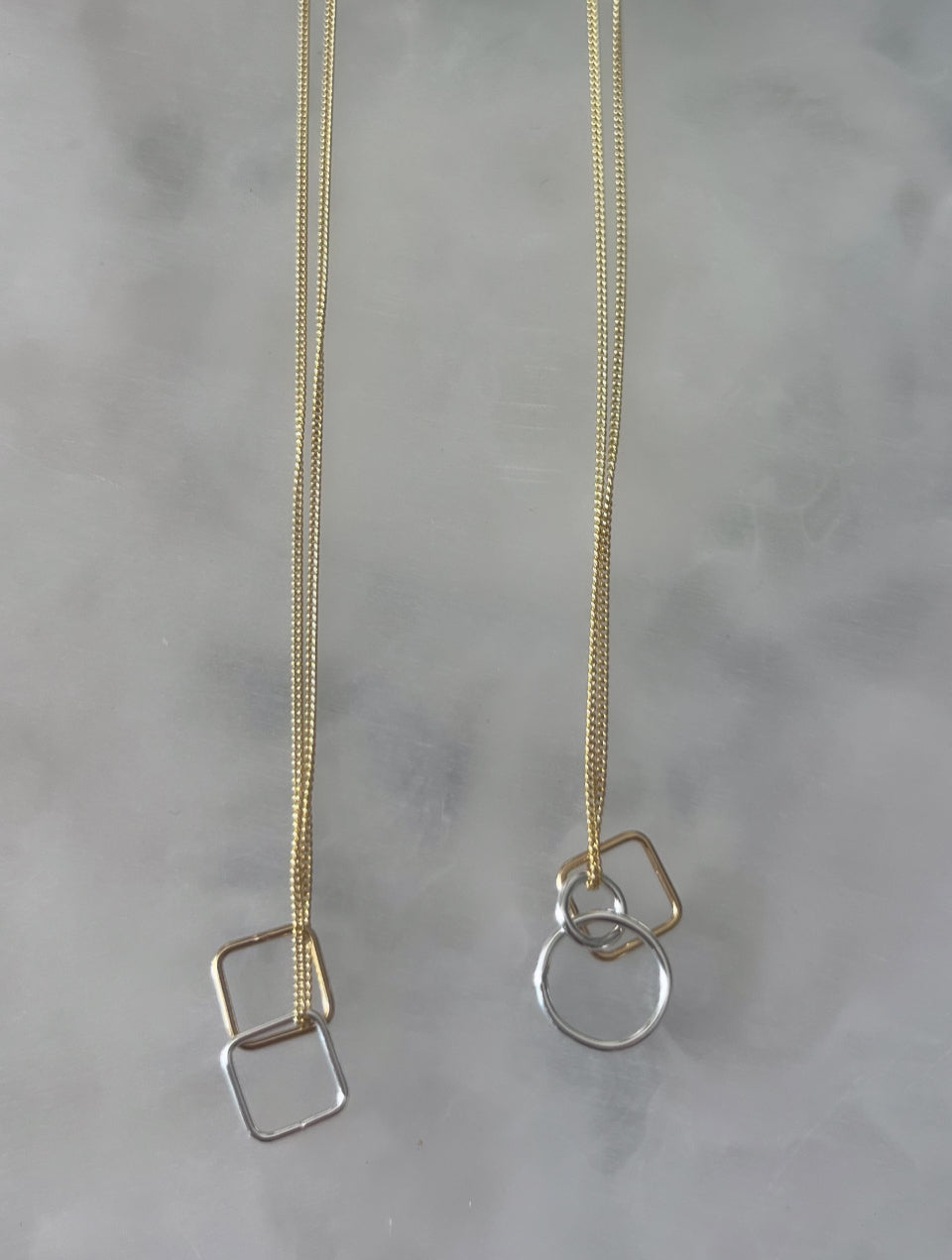 Gold chain with solid silver square and gold square