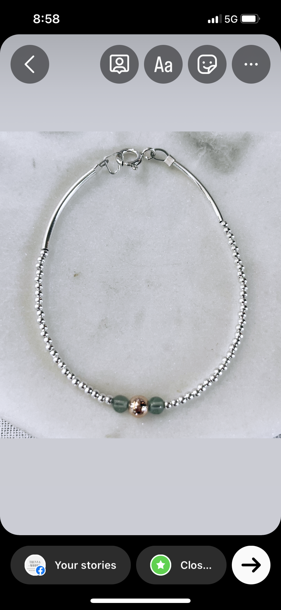 Solid silver bracelet with aqua apatite gemstones and gold ball
