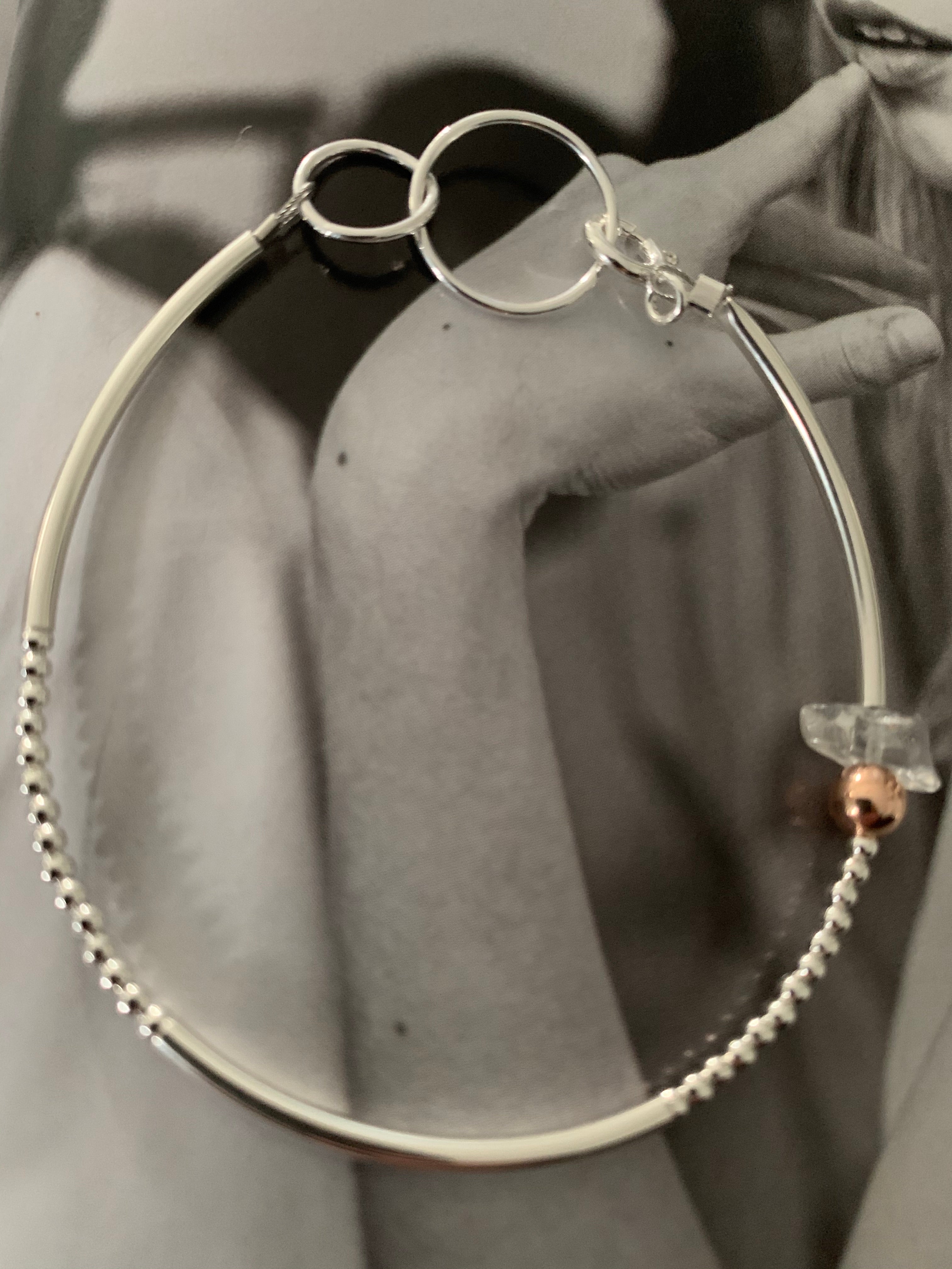 Silver bracelet with interlinked designer links