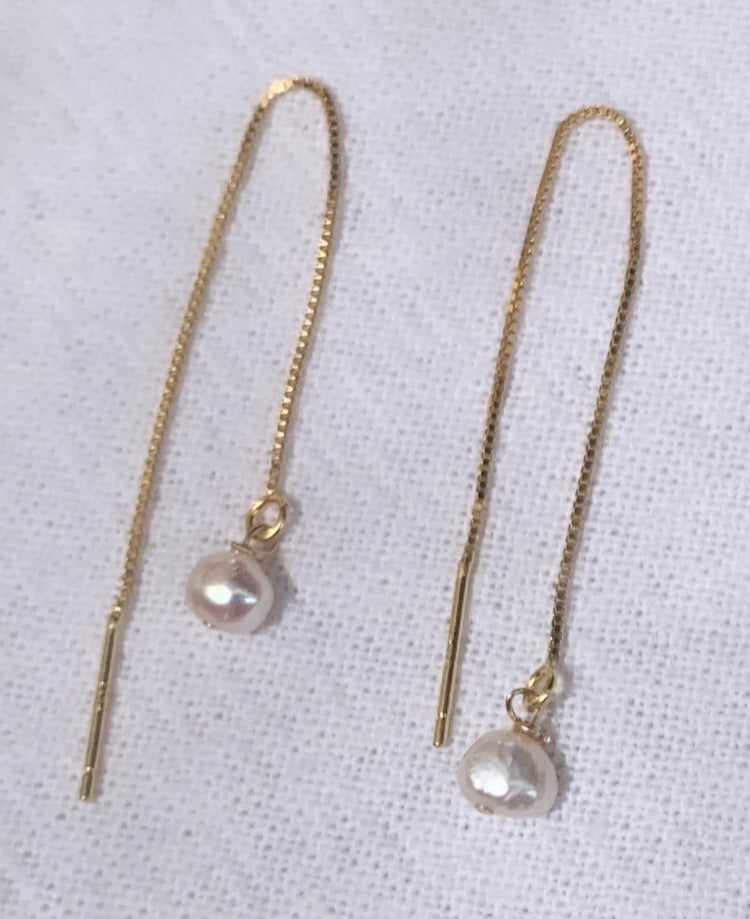 Gold threads with baby freshwater pearls