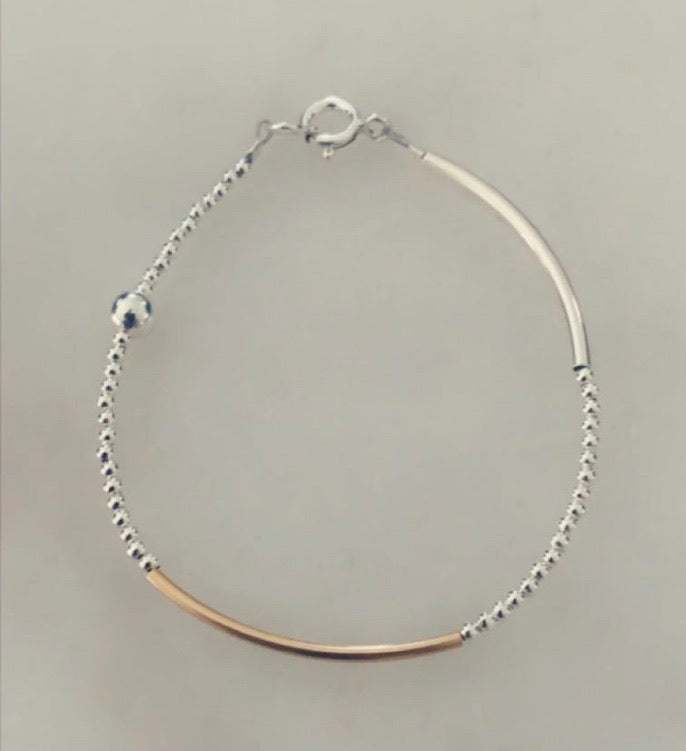Silver and yellow gold bar bracelet