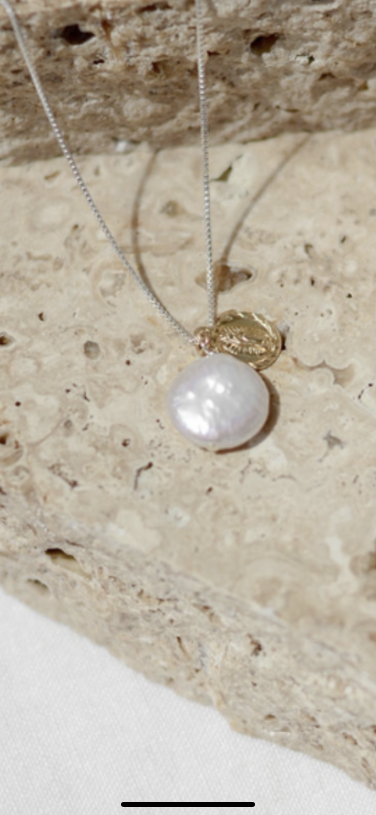 Saint medallion & freshwater pearl necklace