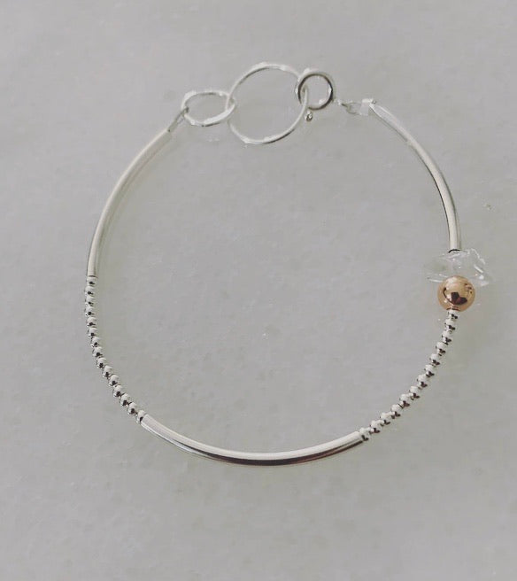 Silver bracelet with interlinked designer links