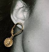 Gold female saint french hook earrings